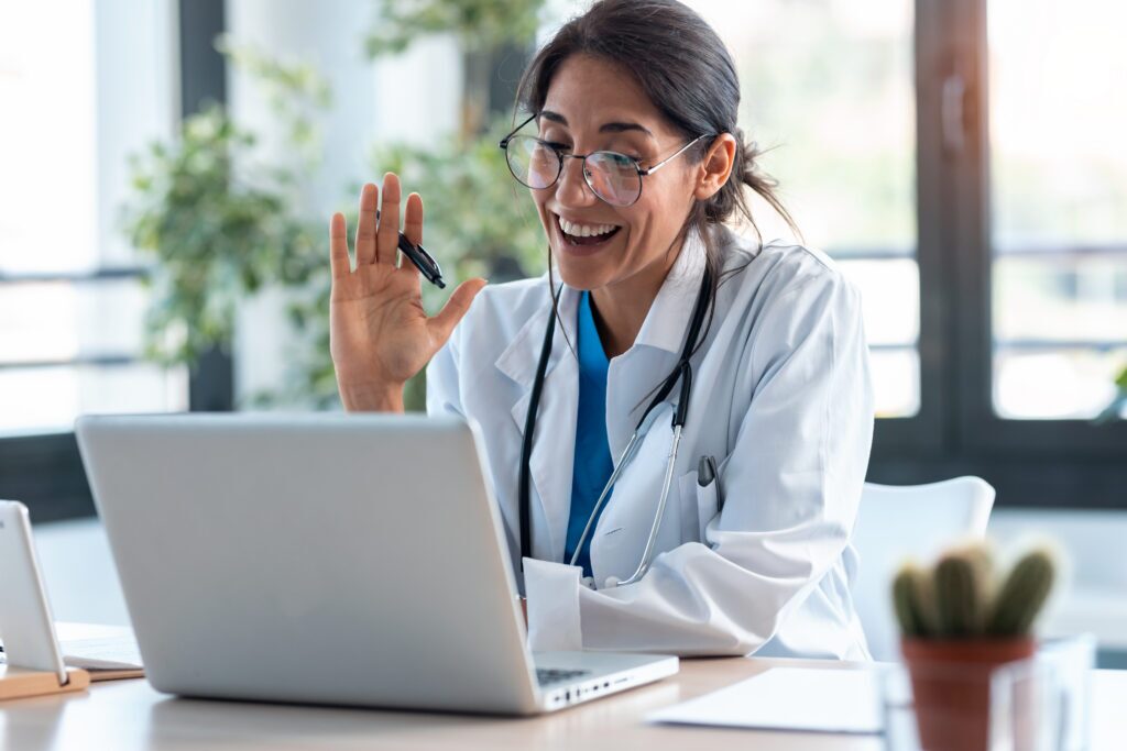 Doctor waving on televisit call